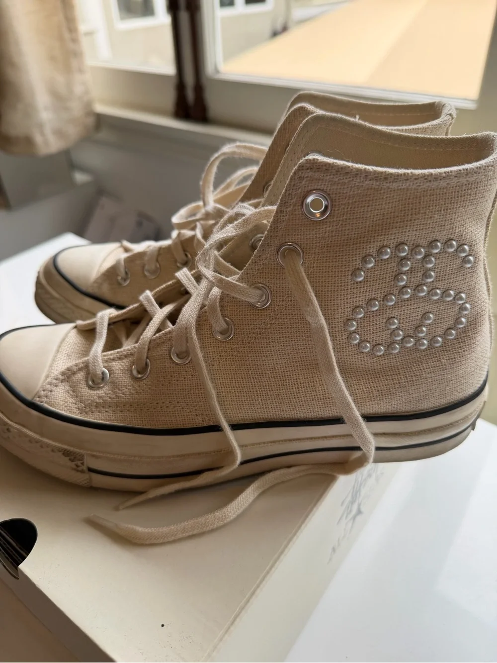 Converse High Top Sneakers in Cream with Black Trim and Rhinestone Star